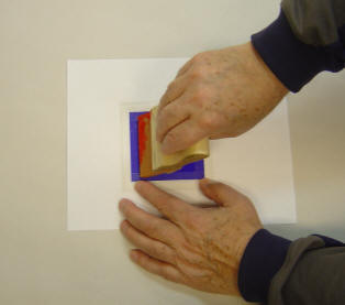Position Your Paint Covered Squeegee Position stencil